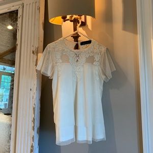 Gorgeous semi sheer tulle summer blouse.